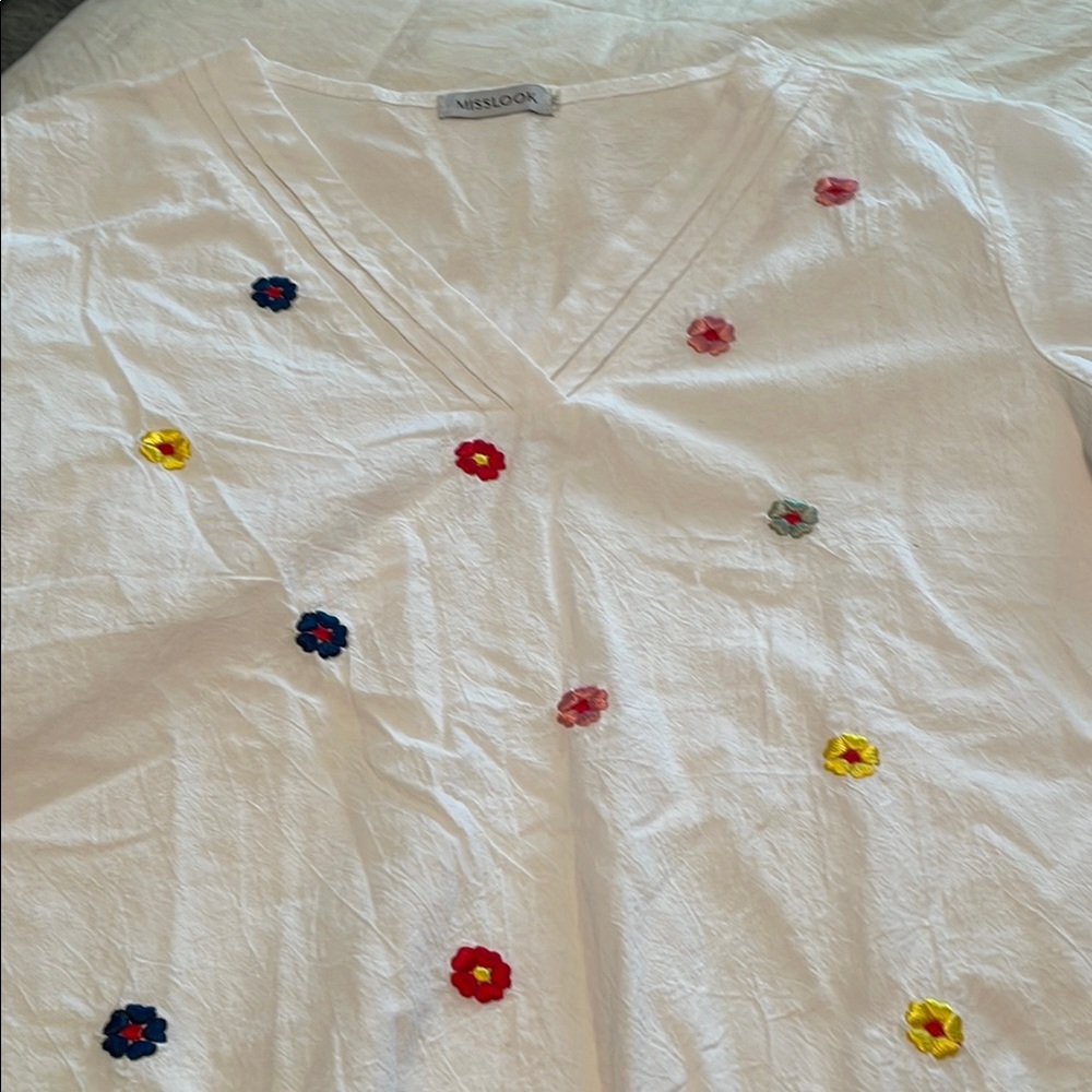 MISSLOOK White V-Neck Blouse with Embellished Design